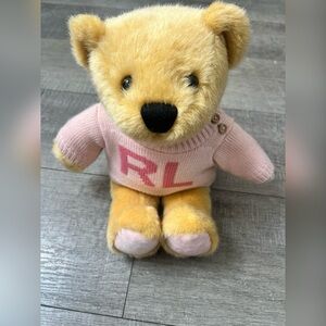 Ralph Lauren The ROMANCE
BEAR Plush Teddy Bear wearing a Pink RL Sweater